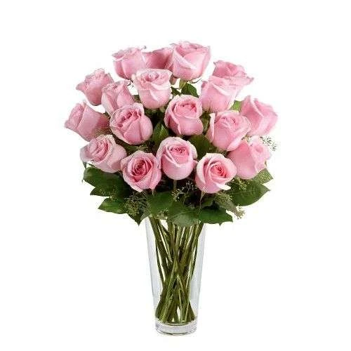 Rosas rosadas en florero