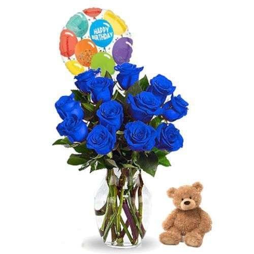 Ramo de rosas azules con florero globo y peluche