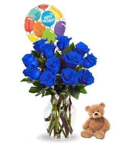 Ramo de rosas azules con florero globo y peluche